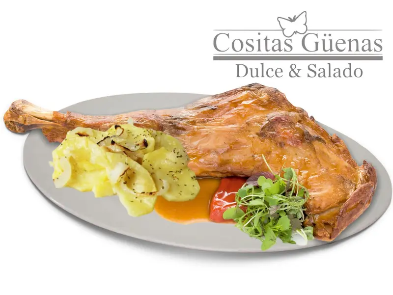 Pierna de cordero lechal al horno con su guarnición
